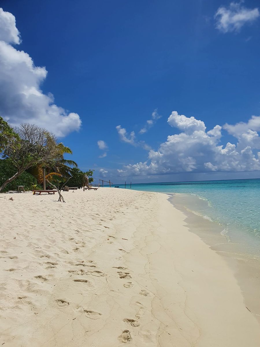 The wide stretch of sand on the tourist beach