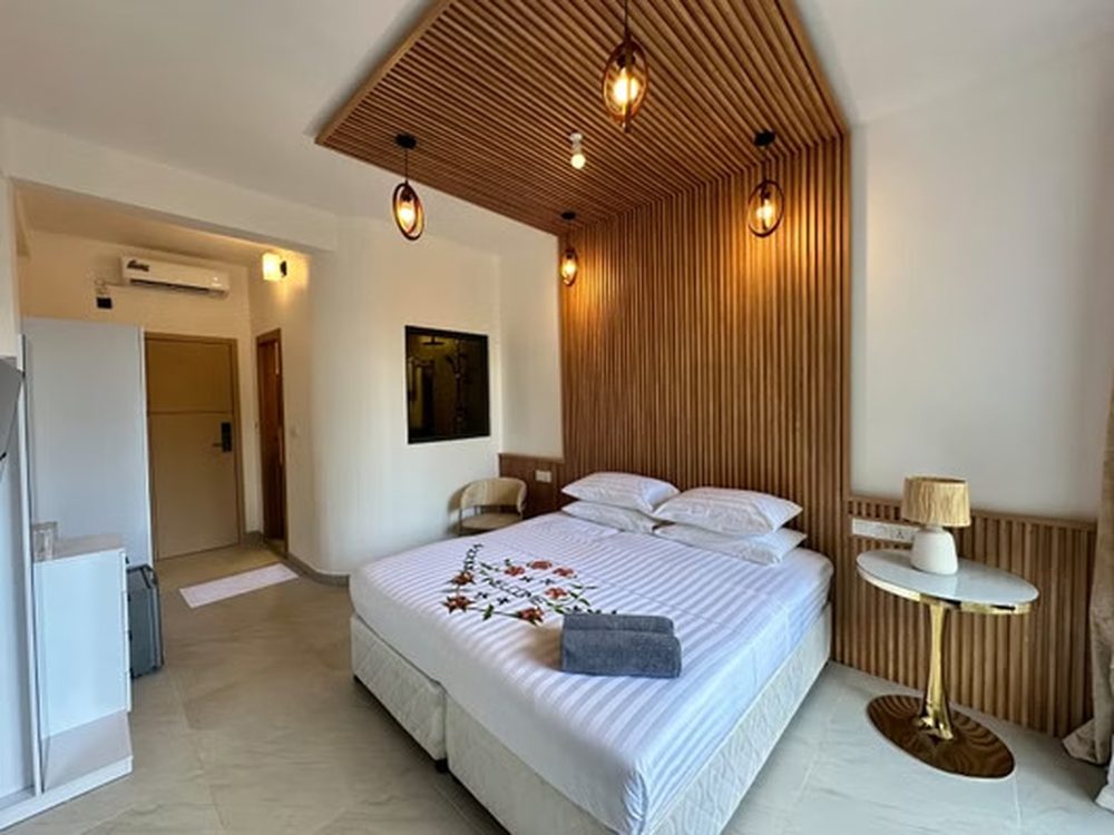 Bed dressed with flowers in a superior room